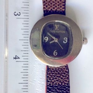 Louis Vuitton Vintage Specimen watch.  Round face
